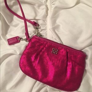 1 New magenta sequins wristlet by Coach